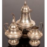 An Egyptian silver four-piece tea and coffee set, comprising coffee pot, teapot,