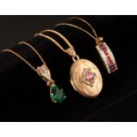 A ruby and diamond set locket in 9ct yellow gold,