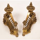 A pair of Empire style brass marble mounted chenets,