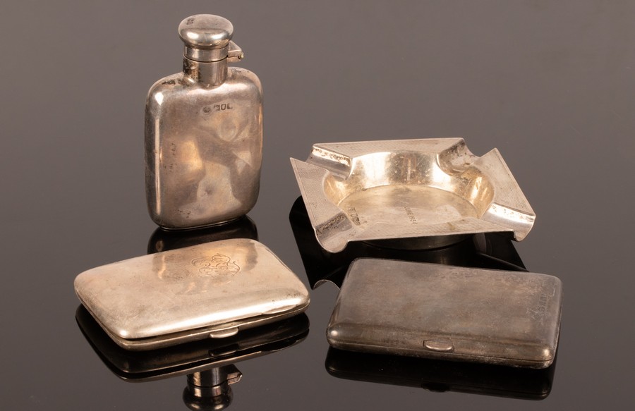 A small Edwardian silver hip flask, London 1902, with engraved name, 9cm long,