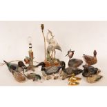 A quantity of carved and painted wooden birds, the largest 35cm long,