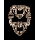 An Art Deco diamond clip, of openwork form, 33mm long, 25mm wide, approximately 10.