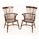 A pair of 19th Century stick back chairs with solid elm seats,