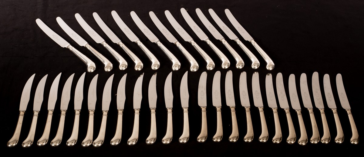 A set of plated pistol grip knives, twelve each of three sizes,