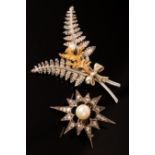 A Victorian diamond and pearl starburst brooch, altered, with central pearl and diamond set rays,