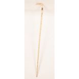 A whalebone and tooth walking cane,