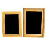 Two gilt framed wall mirrors, the largest 85.