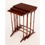 A nest of three rectangular mahogany tables on spindle turned legs and splay feet, 48.