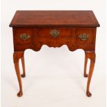 A burr yew kneehole table with surround of three drawers on cabriole legs,