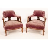 A pair of Edwardian tub-shaped chairs with pierced uprights to the back CONDITION REPORT: