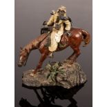 An Austrian cold painted bronze figure of an Arab horseman by Franz Bergmann, signed,