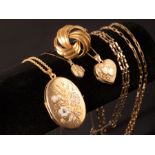 Three 9ct gold lockets on fine link 9ct gold chains, a 9ct gold gate-link bracelet,