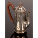 A small silver coffee pot, London 1925, with presentation inscription, 19cm high,