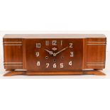 A 1930's IROD mantel clock in a walnut case with eight-day striking chiming movement, 21cm high,