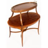 An Edwardian mahogany two-tier tray table crossbanded and with inlaid border and supports,