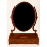 A late 19th Century oval swing frame mirror with three-drawer box base CONDITION REPORT: