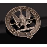 A Scottish white metal clan badge, bearing crest and motto of Cunninghame Graham,