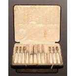 Six silver dessert forks with mother-of-pearl handles, Sheffield 1912,