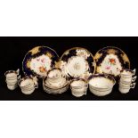An English porcelain flower-painted part tea and coffee service, with blue and gilt borders,
