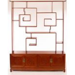 A Chinese display cabinet, the upper section with an arrangement of open shelves,