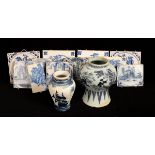 An 18th Century Dutch delft blue and white vase, five tiles of biblical subject, five equestrian,