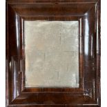 A William and Mary walnut cushion shaped mirror,