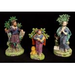 Three pearlware figures of saints, Paul, Mark and Peter, with attributes, Paul marked Walton,