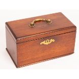 A mahogany tea caddy with brass handle and three-division interior,