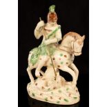 A Staffordshire creamware group of St George and the Dragon, 28.