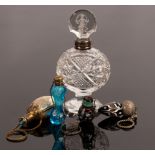 Two Venetian glass scent bottles, a cut glass scent bottle with silver collar,