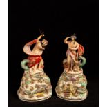 A pair of 19th Century Staffordshire figures of Neptune and Venus,
