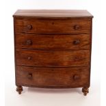 A 19th Century mahogany and crossbanded bowfront chest of four long drawers, with gadrooned knobs,