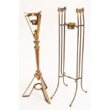 Two large Arts & Craft style copper and brass kettle stands, the uprights in the form of spades,