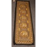 An Indian embroidered wall hanging, decorated elephants in sequins, gilt thread and moonstones,