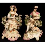 A pair of Continental porcelain candlestick figures of shepherd and shepherdess musicians,