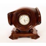 A novelty mantel clock,