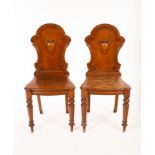 A pair of Victorian oak chairs with cartouche shaped backs CONDITION REPORT: