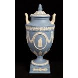 A Wedgwood pale blue jasper two-handled vases and cover with acorn finial,
