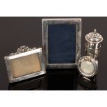 Three easel back silver photograph frames,