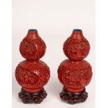 A pair of Chinese cinnabar lacquer double gourd vases,