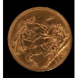 A George V gold sovereign,