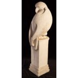 A composite stone sculpture of an eagle by Paul Harvey 2007, 90cm high,
