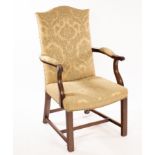 A mahogany Gainsborough armchair of George III design with padded scroll arms,