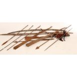 A quantity of tribal weapons, to include a bow, polychrome and barbed arrows, machete and spear,