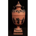 A Wedgwood rosso antico vase and cover with Bacchic mask handles,