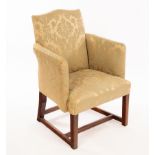 An upholstered armchair,