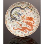 A Chinese famille rose porcelain plate, decorated dragons,