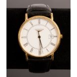 A gentleman's 18k gold cased Longines wristwatch the dial with Roman numerals and date aperture,