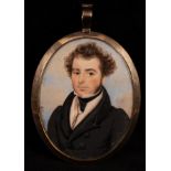 E Taylor (1780-1830)/Portrait Miniature of a Gentleman/wearing a black coat,