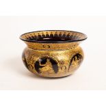 A Bohemian amethyst glass bowl with flared rim, gilt with roundels of Classical figures and masks,